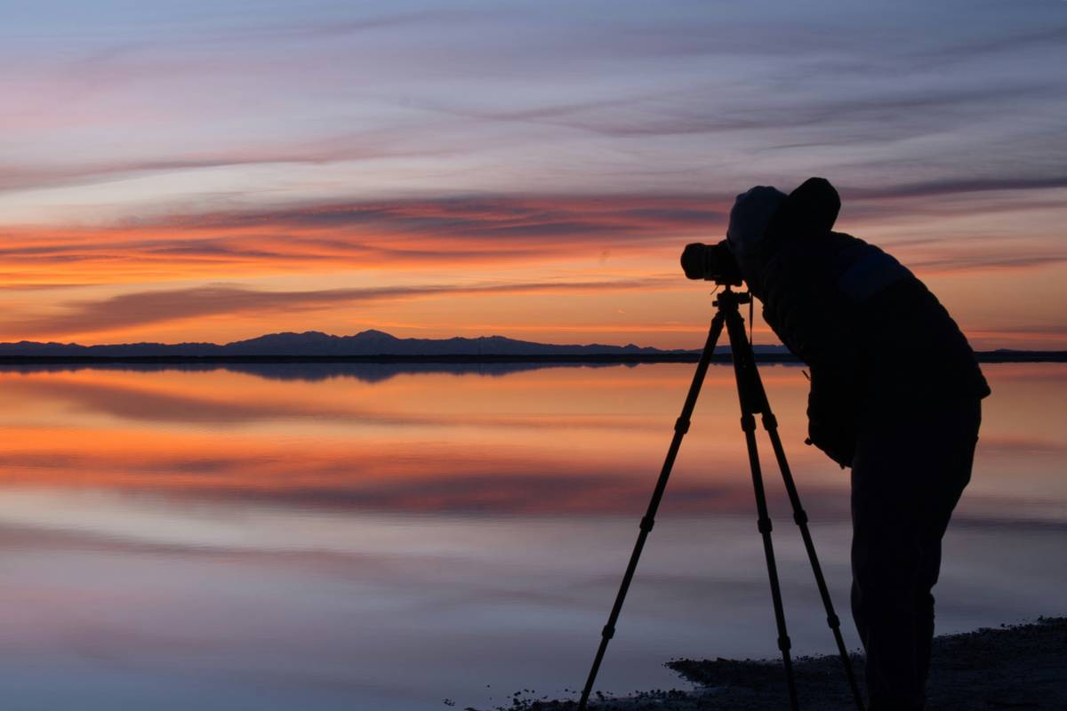Stunning image of mountains reflected in a calm alpine lake.