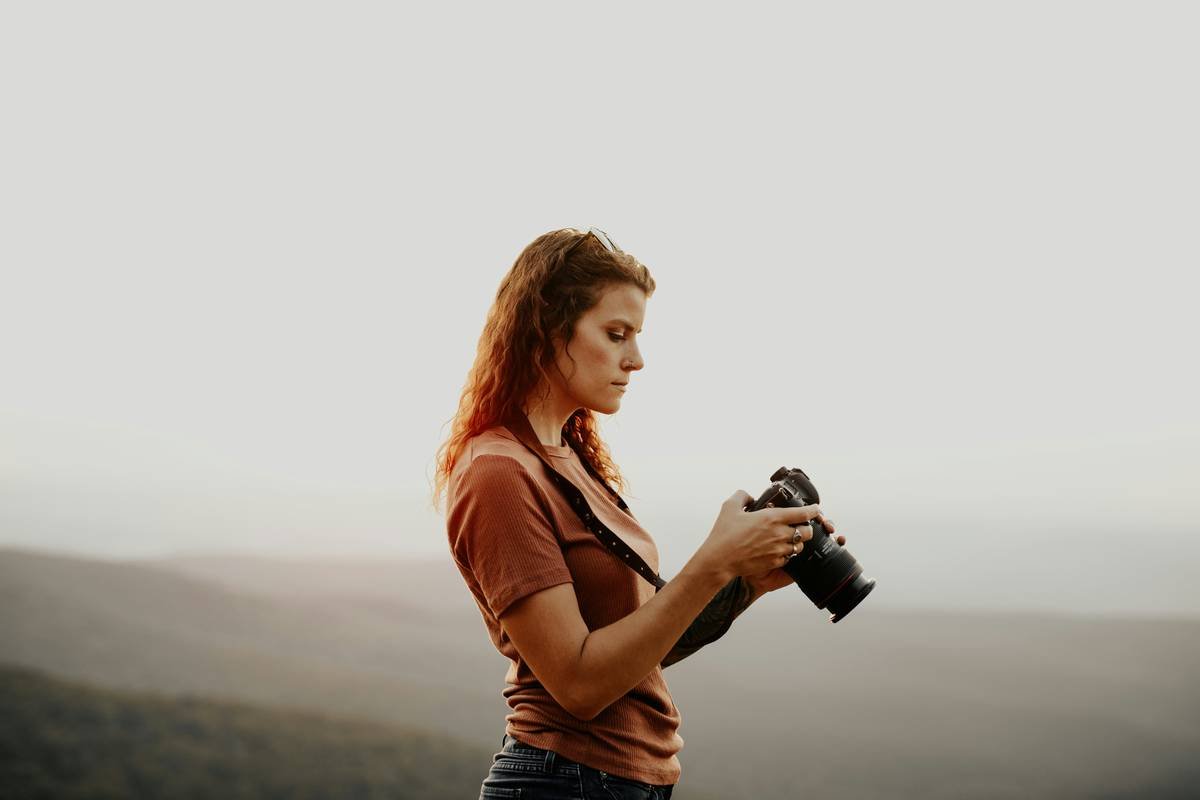 Comparison chart of top adventure cams showing weight, battery life, waterproof rating, and price for hiking use