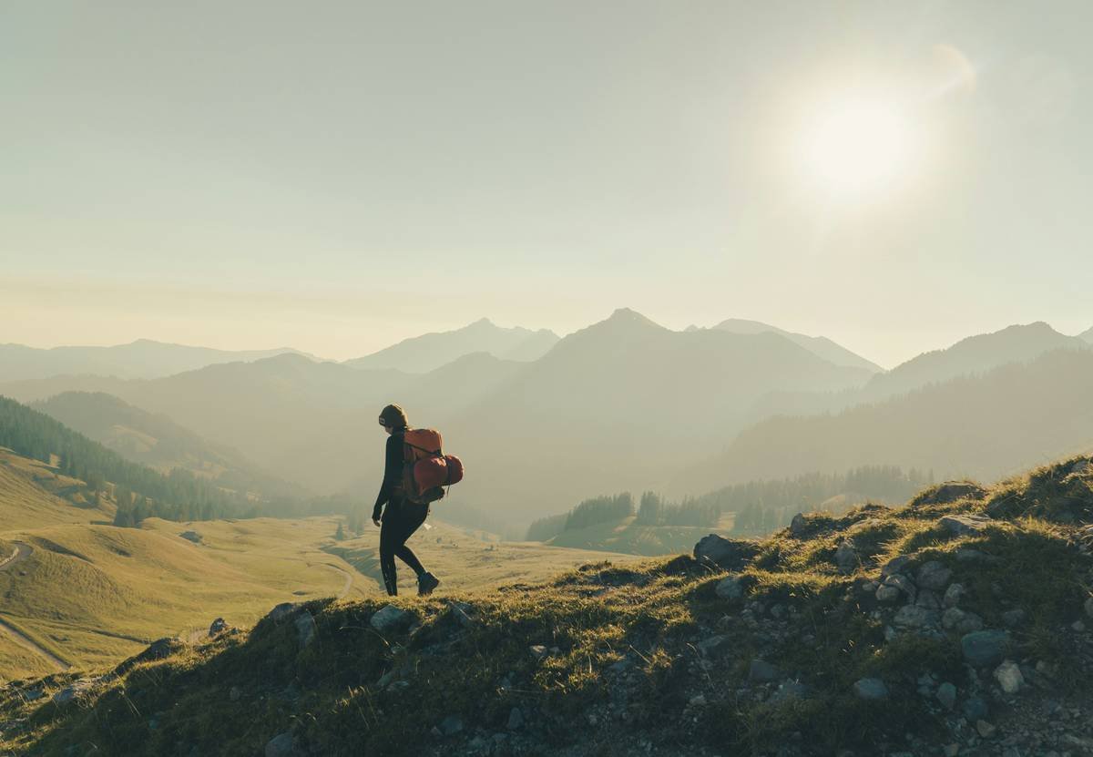Hiking in the Swiss alps by sunny weather