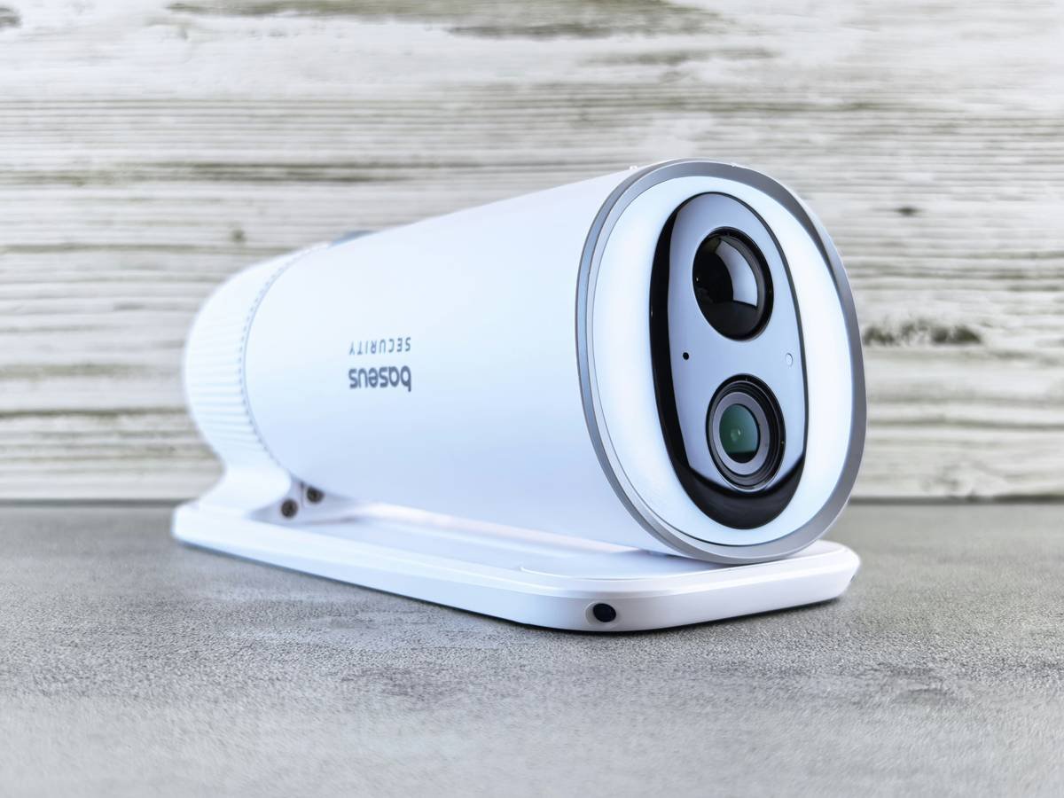 Premium outdoor cameras mounted on hiking gear in rainy forest